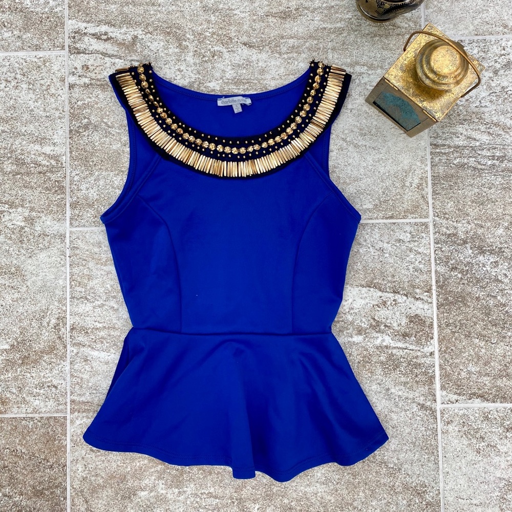 Previously loved peplum top